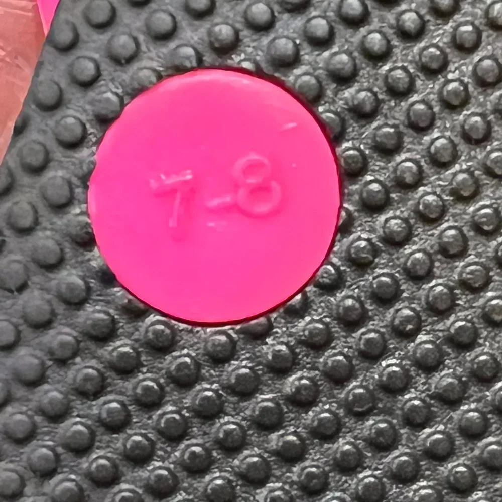 Kate Spade black /white polka dot with pink size 7/8 flip flop